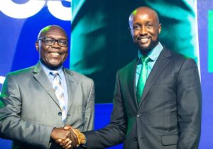 Gor Mahia FC Chairman Ambrose Rachier and SportPesa Chairman CEO Ronald Karauri