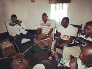 National Assembly Speaker Moses Wetangula takes Busaa using traditional straws in an Undated photo